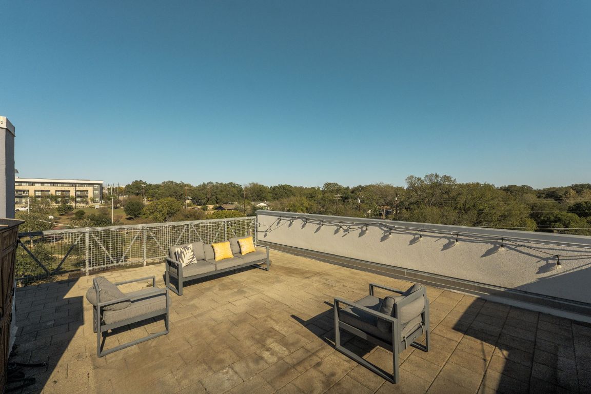 4801 South Congress Avenue, Unit S3 Austin, TX 78745 - Photo 31 of 40 a view of a terrace with couches and sky view