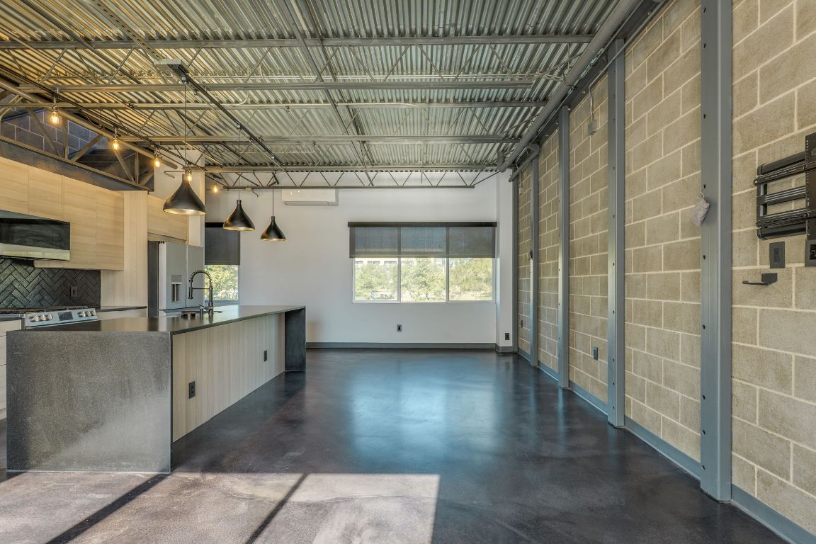 4801 South Congress Avenue, Unit S3 Austin, TX 78745 - Photo 5 of 40 a view of a hallway with wooden floor