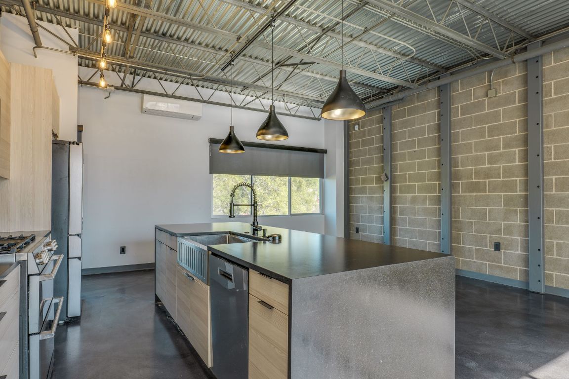 4801 South Congress Avenue, Unit S3 Austin, TX 78745 - Photo 6 of 40 a utility room with faucet