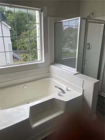 a bathroom with a sink and a bathtub