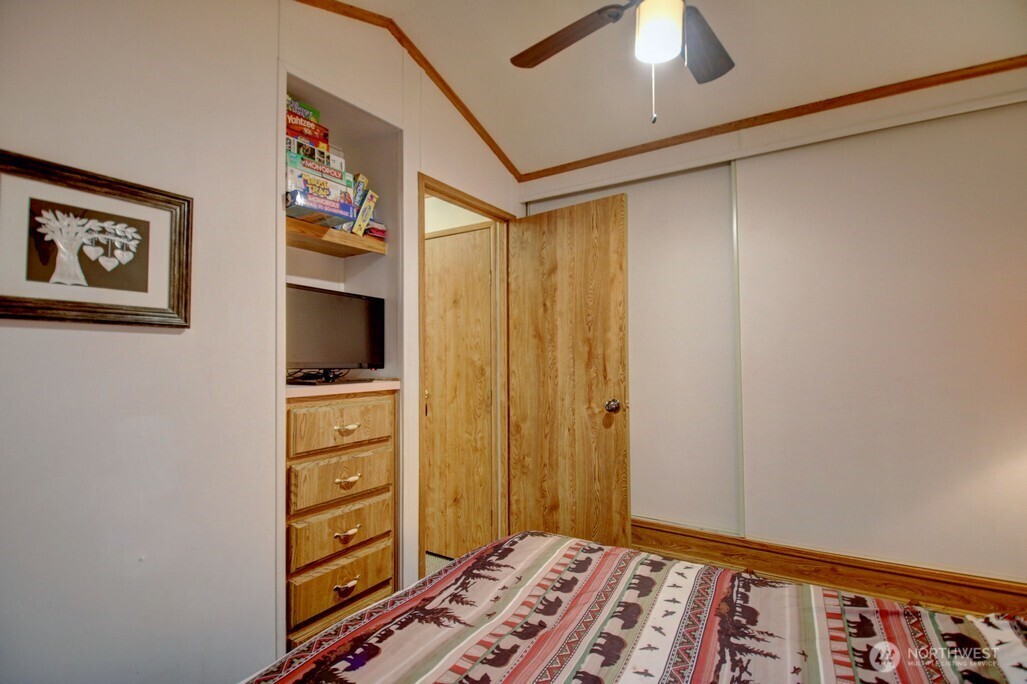 35 Branch Circle Maple Falls, WA 98266 - Photo 12 of 37 a view of bedroom with furniture and flat screen tv