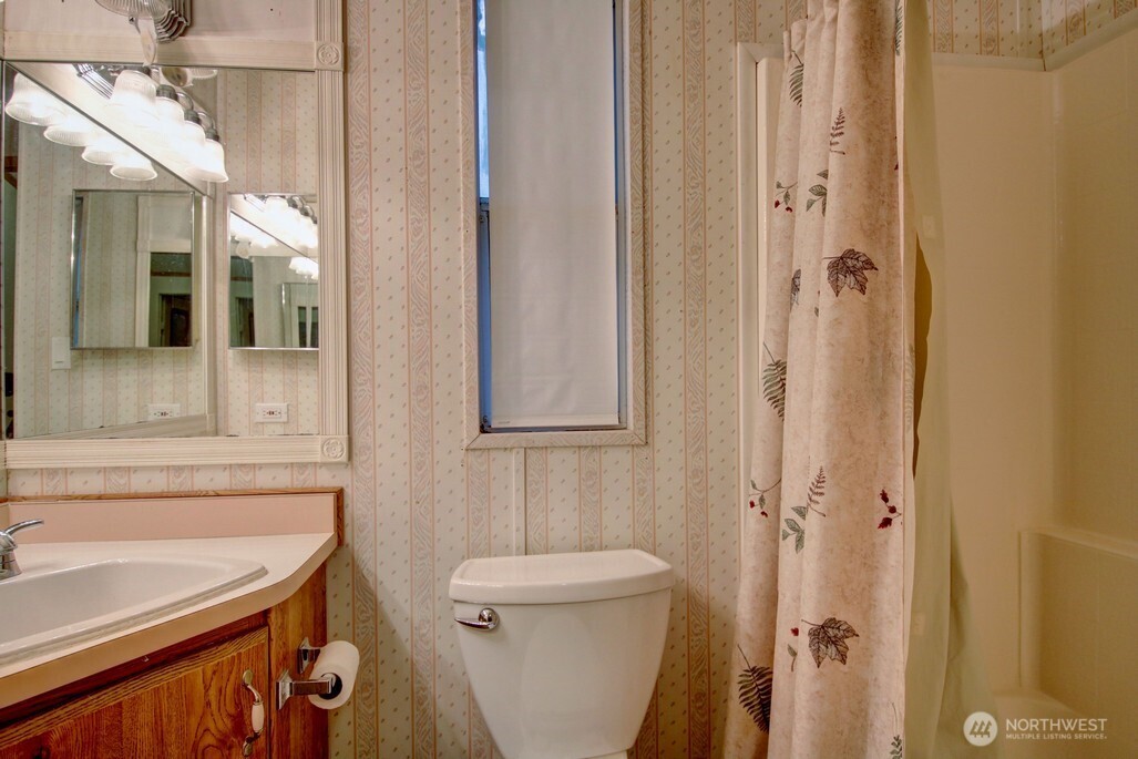 35 Branch Circle Maple Falls, WA 98266 - Photo 15 of 37 a bathroom with a sink a toilet and shower