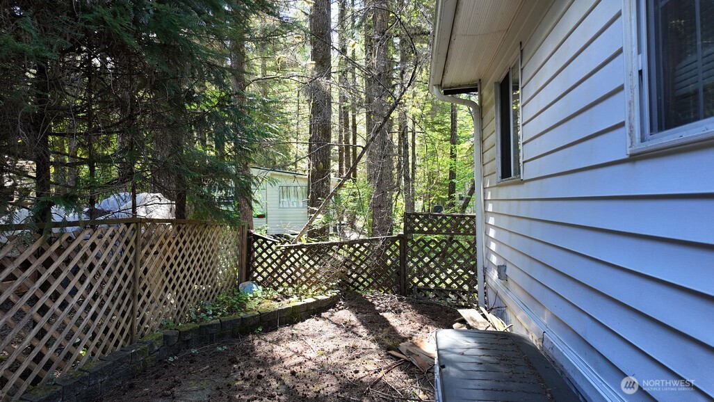 35 Branch Circle Maple Falls, WA 98266 - Photo 21 of 37 a view of a house with a wooden fence