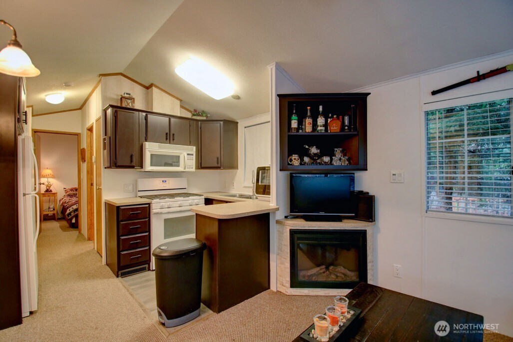 35 Branch Circle Maple Falls, WA 98266 - Photo 8 of 37 a kitchen with stainless steel appliances a stove sink and refrigerator