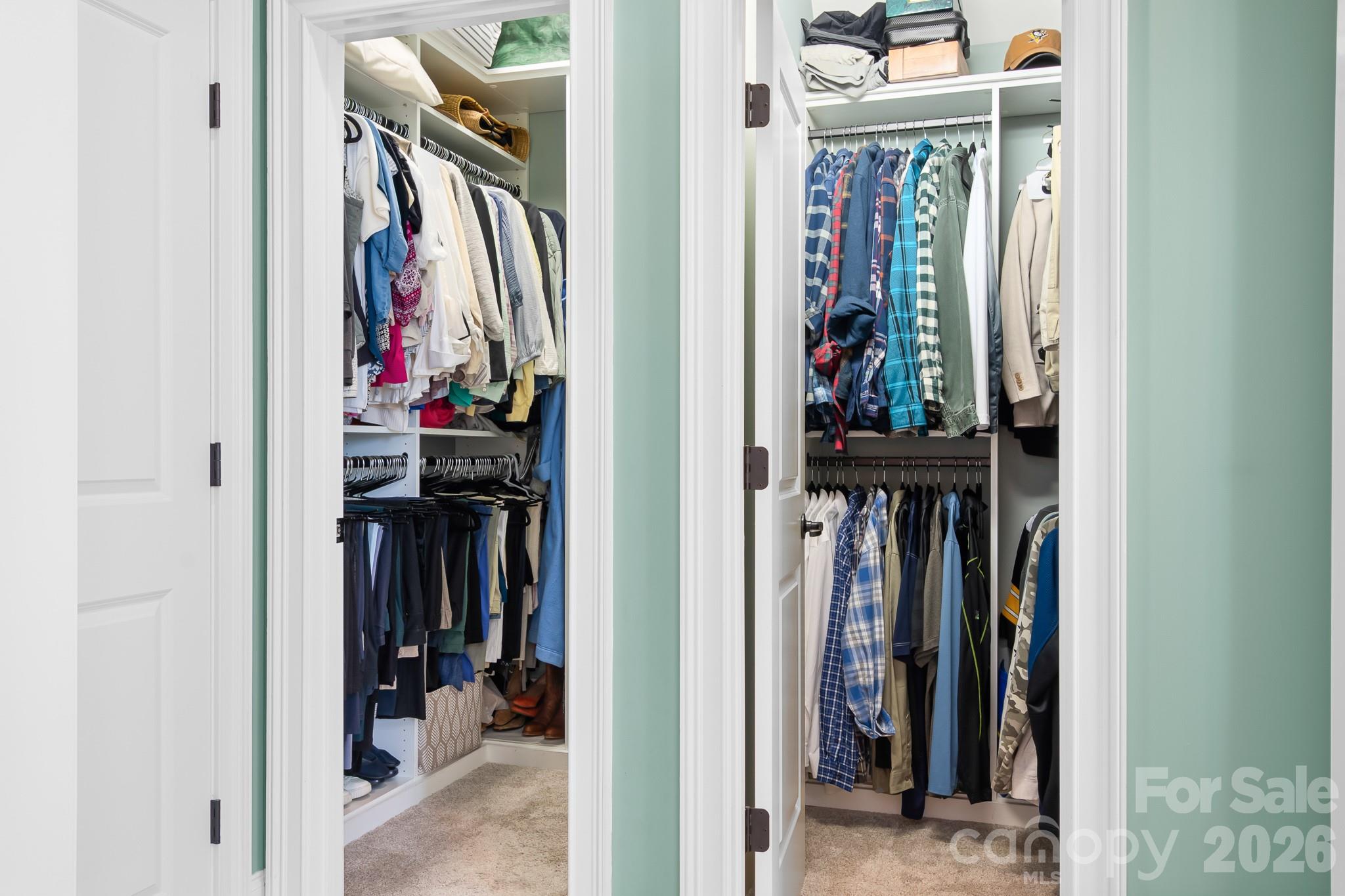 1215 Inn Keepers Way Cornelius, NC 28031 - Photo 12 of 35 a view of walk in closet with clothes and shoes