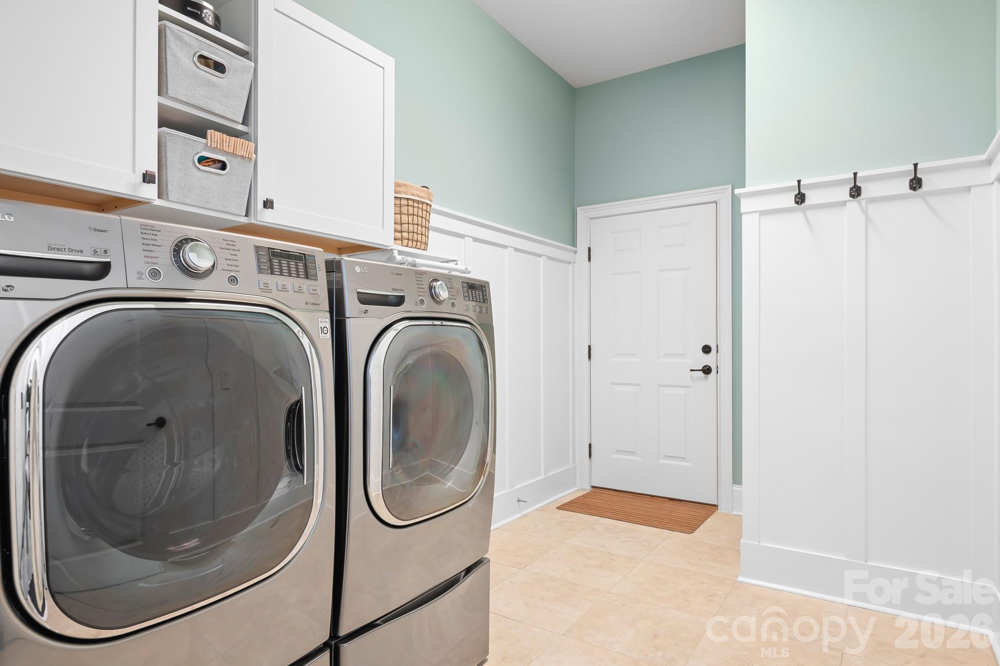 1215 Inn Keepers Way Cornelius, NC 28031 - Photo 13 of 35 a utility room with dryer and washer
