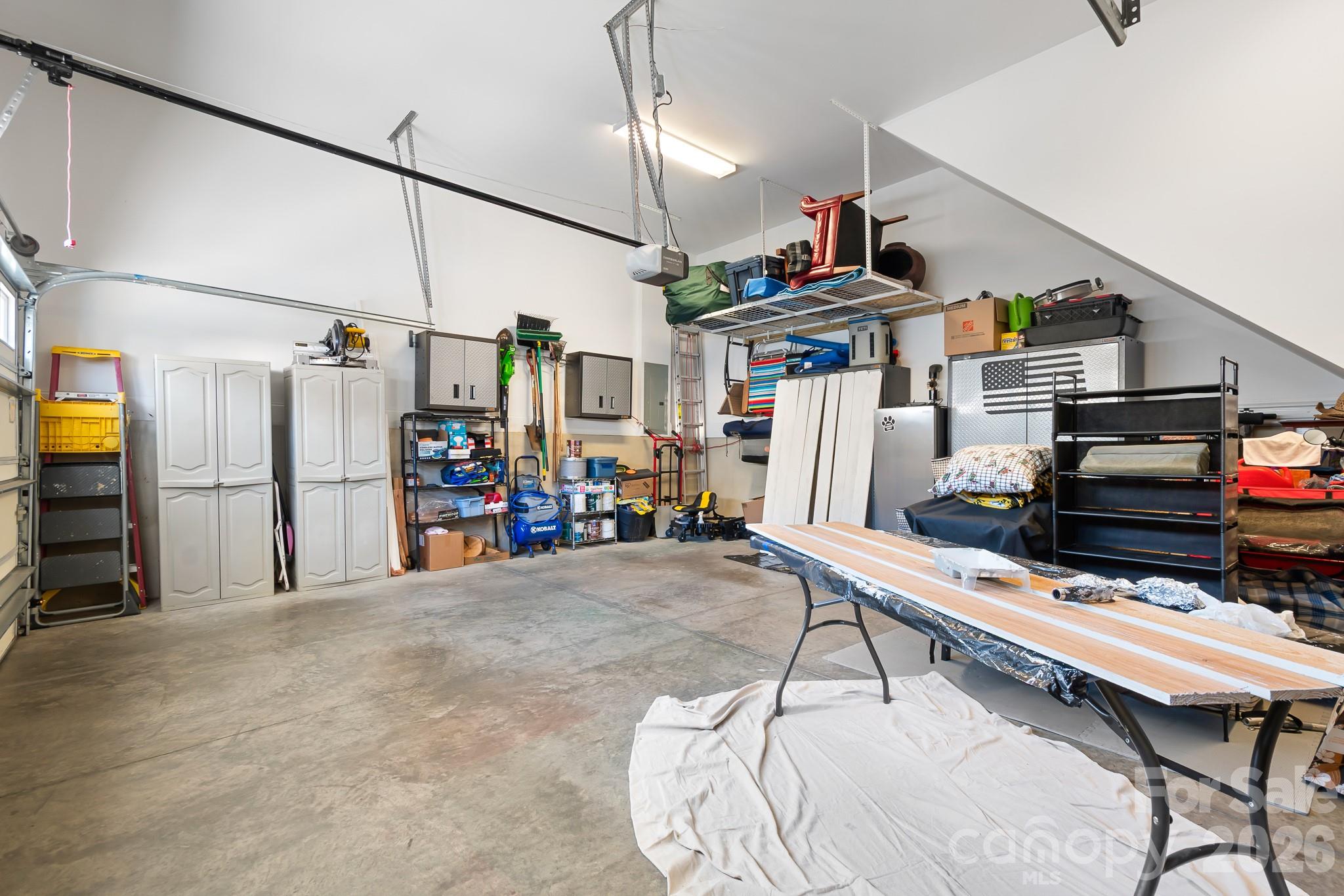 1215 Inn Keepers Way Cornelius, NC 28031 - Photo 20 of 35 a room with furniture and a flat screen tv