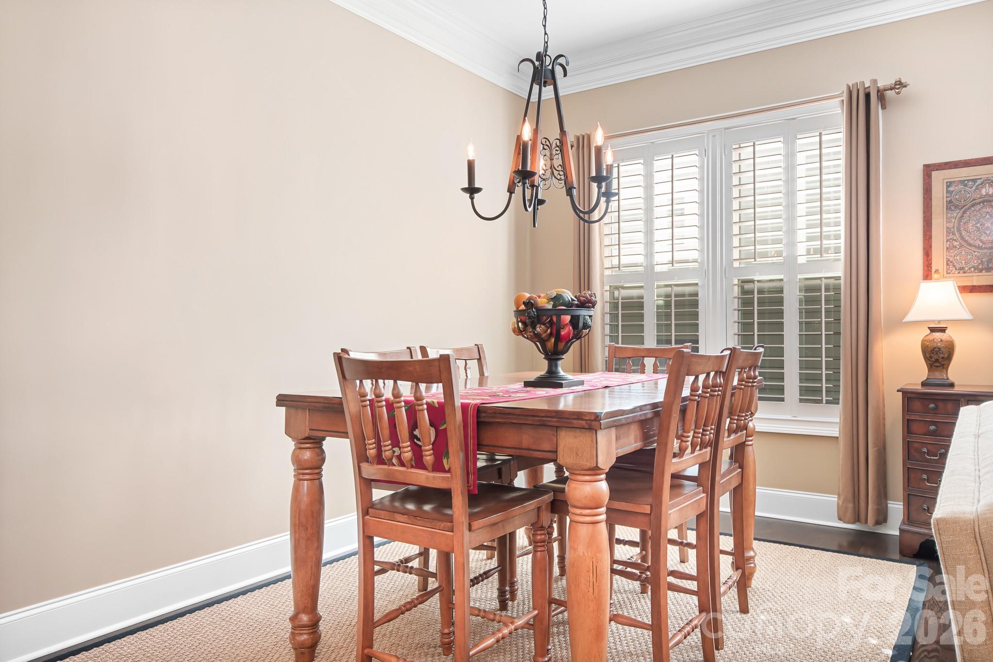 1215 Inn Keepers Way Cornelius, NC 28031 - Photo 8 of 35 a view of a dining room with furniture window and outside view