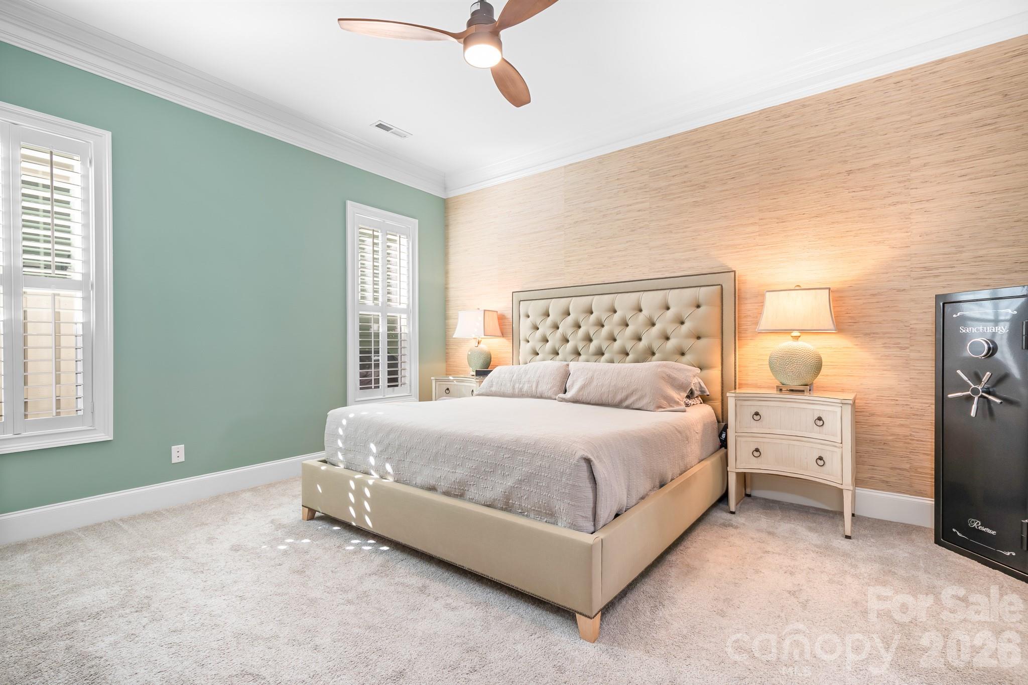 1215 Inn Keepers Way Cornelius, NC 28031 - Photo 9 of 35 a bed room with a bed and a window