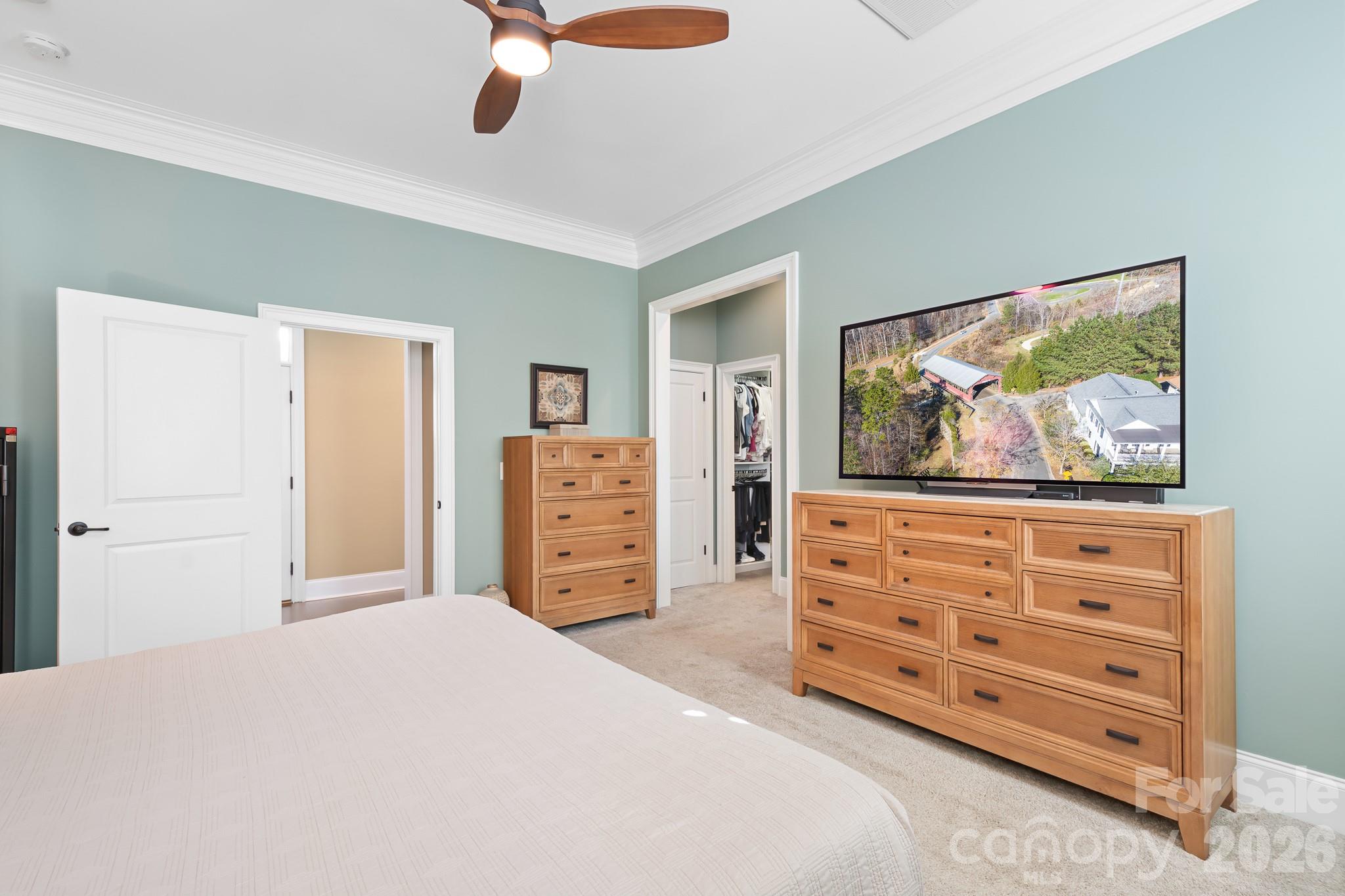 1215 Inn Keepers Way Cornelius, NC 28031 - Photo 10 of 35 a bedroom with a bed and a dresser