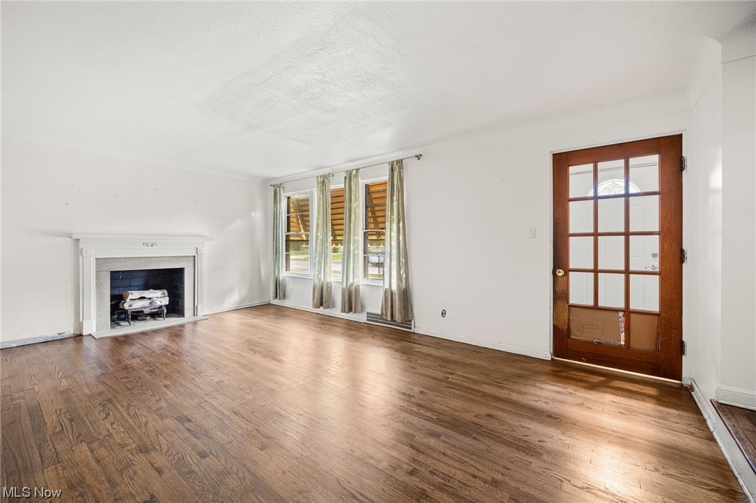 3799 Colony Road South Euclid, OH 44118 - Photo 2 of 34 Unfurnished living room featuring hardwood / wood-style floors