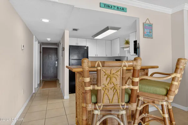 a bedroom with a bed couch and view living room