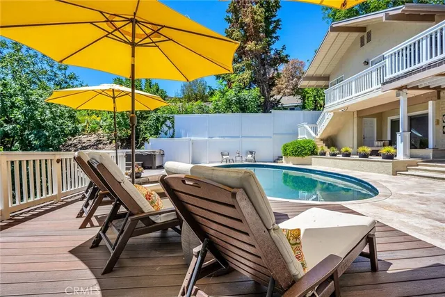 a view of balcony with outdoor seating