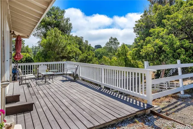 a view of a yard with an outdoor space