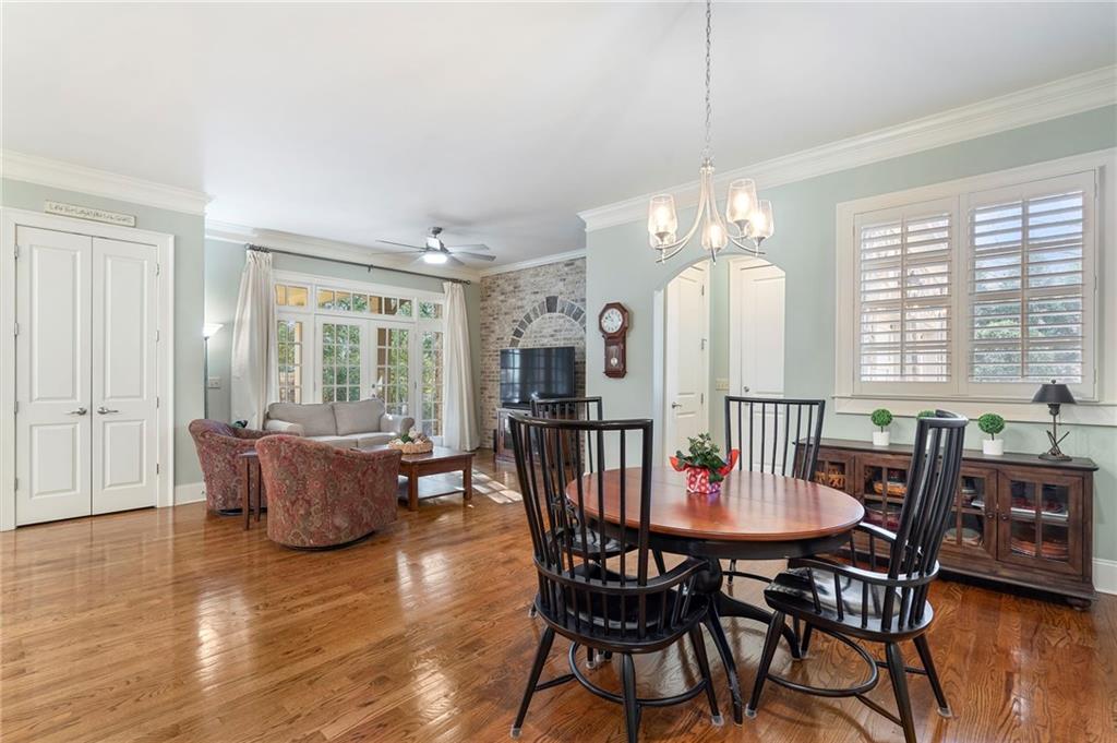 1665 High Trail Southeast Atlanta, GA 30339 - Photo 12 of 53 a view of a dining room with furniture window and wooden floor
