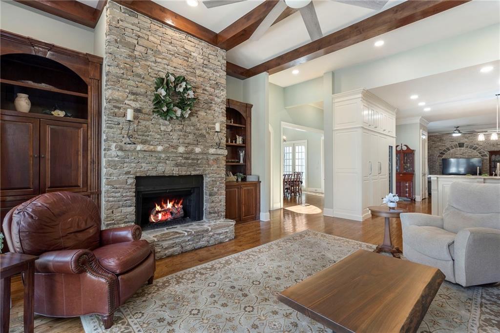 1665 High Trail Southeast Atlanta, GA 30339 - Photo 17 of 53 a living room with furniture and a fireplace