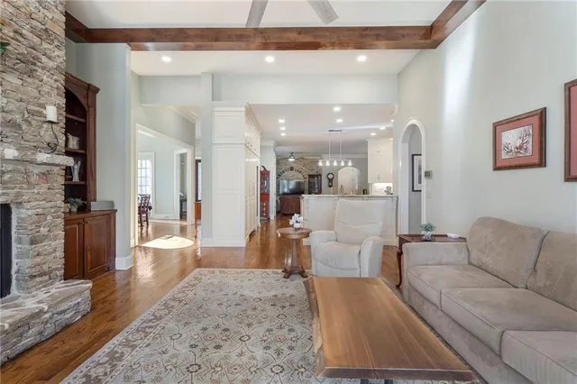 a view of a roof deck with wooden floor and fence
