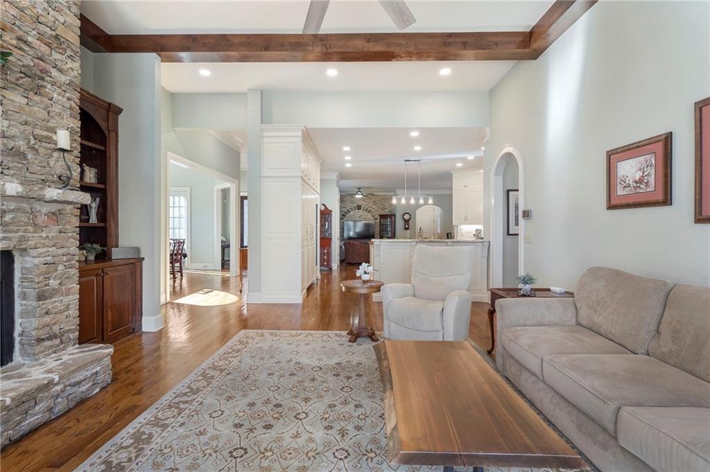 1665 High Trail Southeast Atlanta, GA 30339 - Photo 18 of 53 a living room with furniture and a fireplace