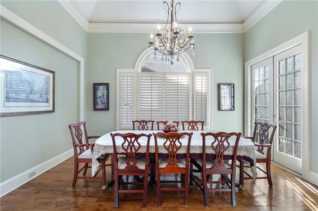 1665 High Trail Southeast Atlanta, GA 30339 - Photo 21 of 53 a view of a dining room with furniture window and wooden floor