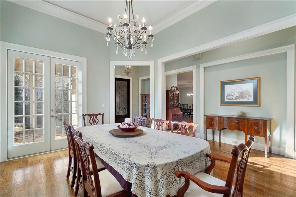 1665 High Trail Southeast Atlanta, GA 30339 - Photo 23 of 53 a view of a dining room with furniture window and wooden floor