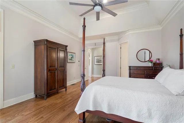 a bathroom with a double vanity sink mirror and a bathtub