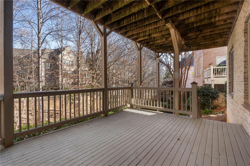 1665 High Trail Southeast Atlanta, GA 30339 - Photo 43 of 53 a view of deck with wooden floor and fence