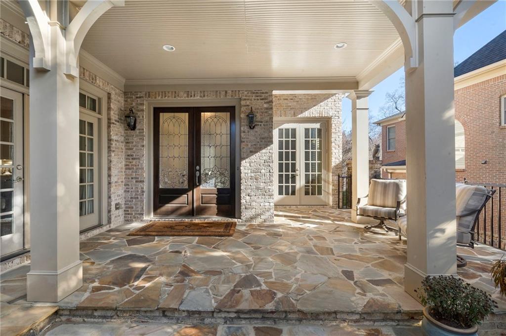 1665 High Trail Southeast Atlanta, GA 30339 - Photo 5 of 53 a view of a hall with wooden floor and a rug