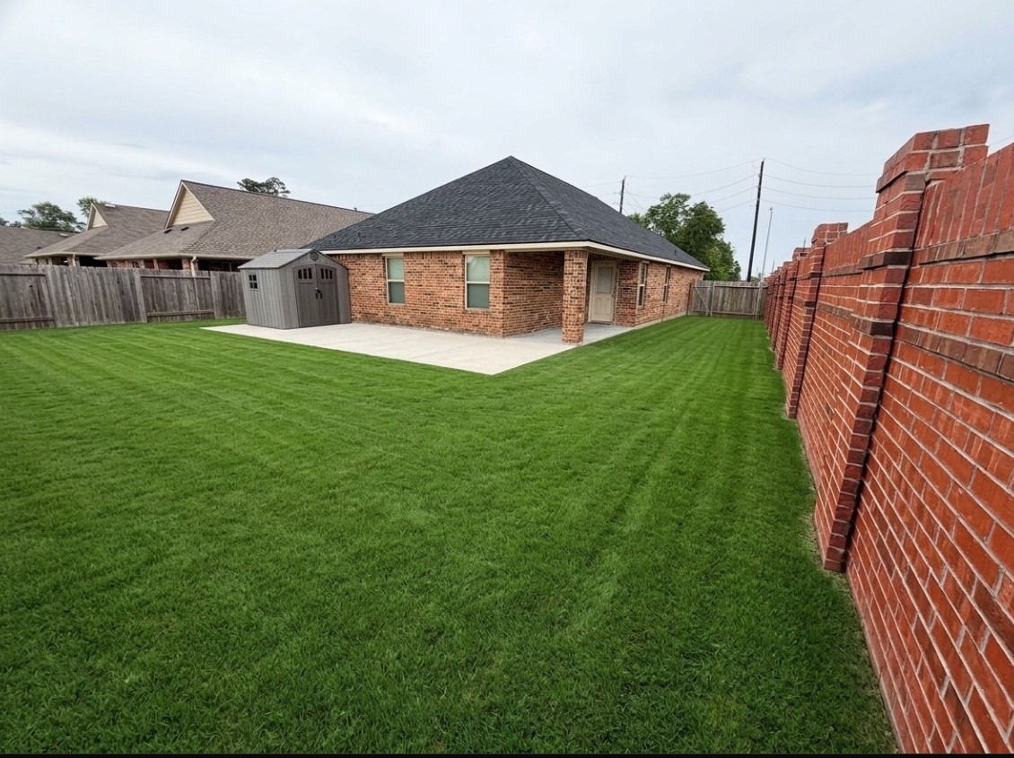 24307 Hampton Terrace Lane Spring, TX 77389 - Photo 18 of 20 Imagine the possibilities in this spacious backyard, ready for your personal touch.