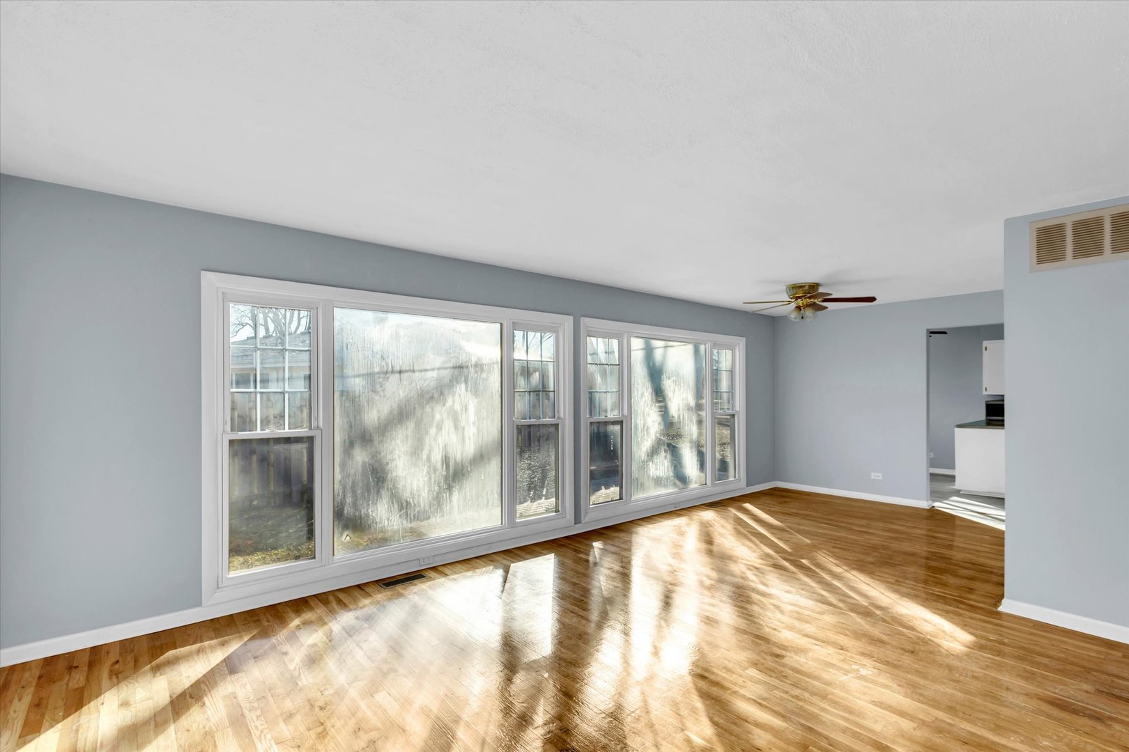 465 Washington Boulevard Hoffman Estates, IL 60169 - Photo 12 of 26 a view of an empty room with a window