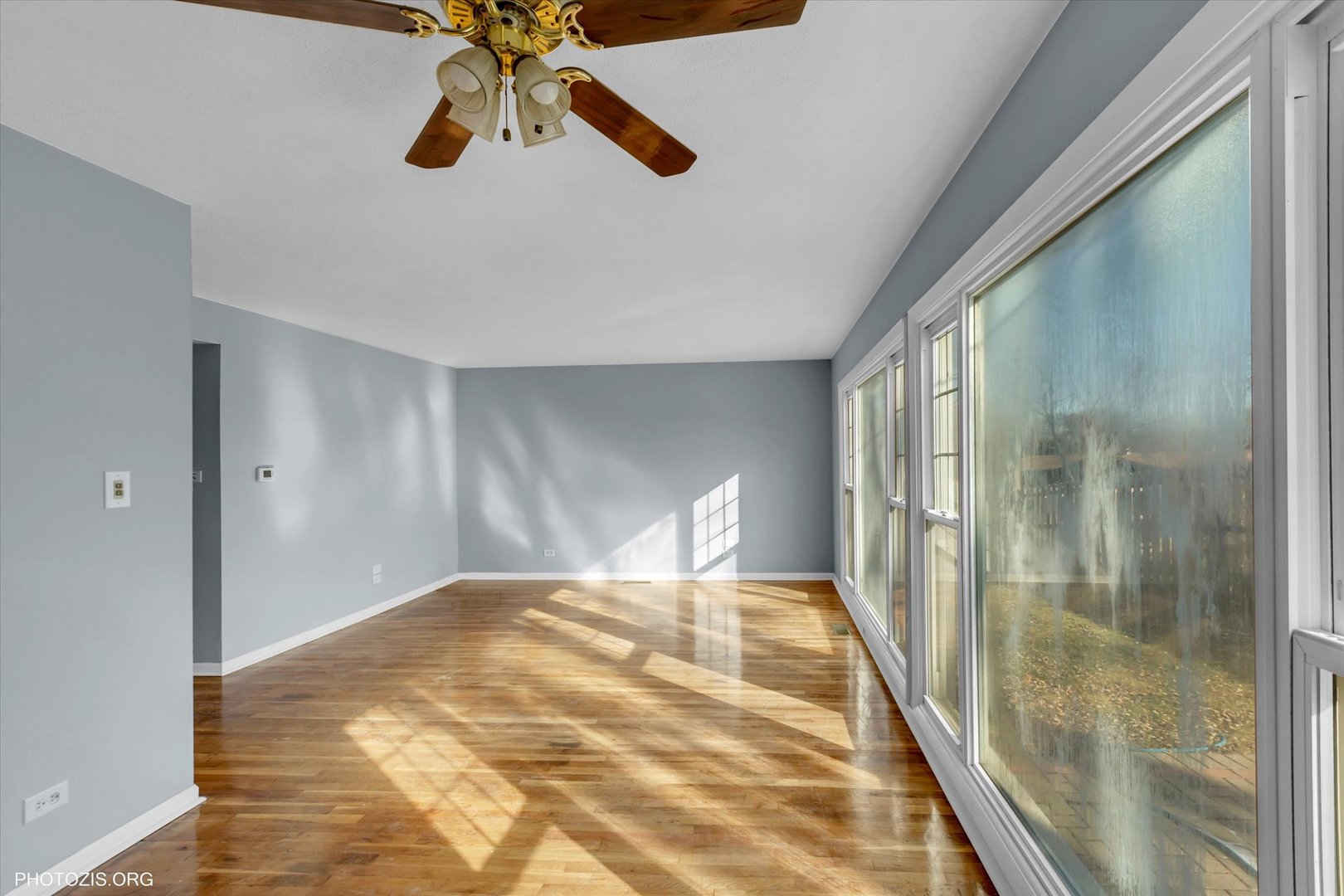 465 Washington Boulevard Hoffman Estates, IL 60169 - Photo 14 of 26 a bedroom with a bed and a chandelier