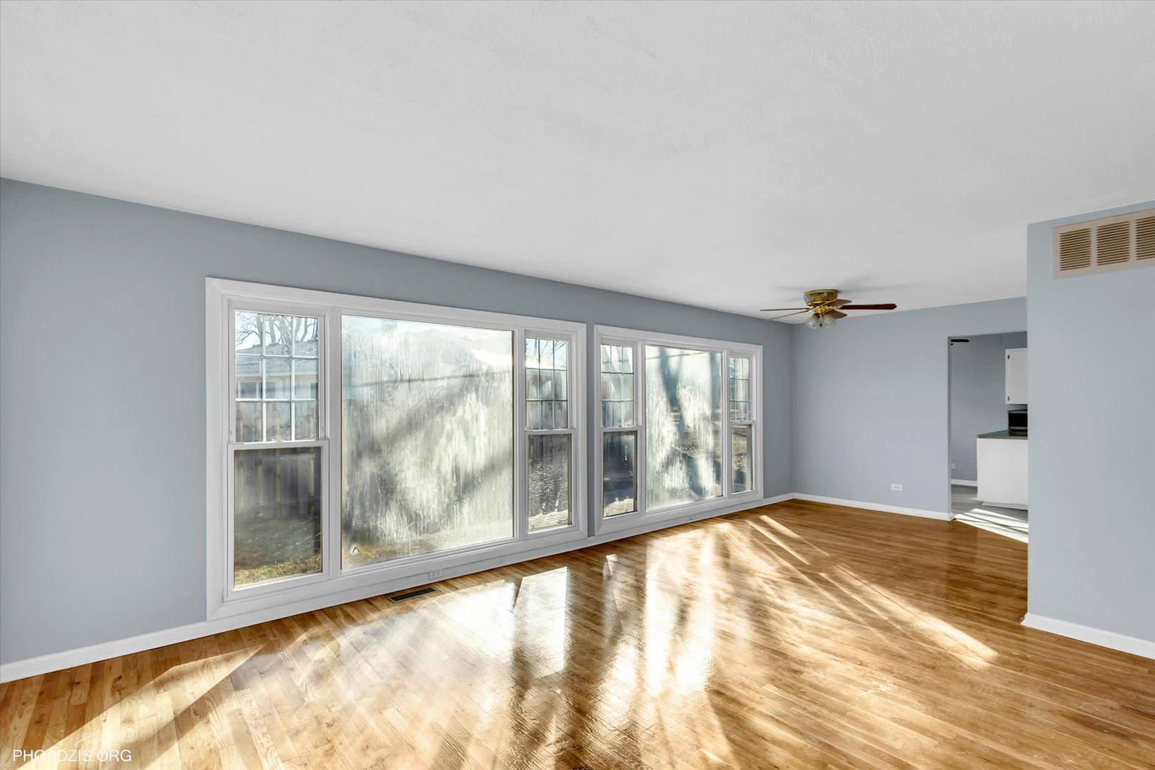465 Washington Boulevard Hoffman Estates, IL 60169 - Photo 8 of 26 a view of an empty room with a window