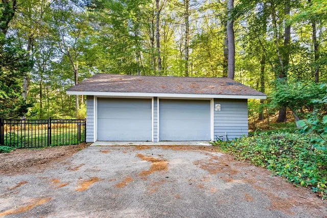 a front view of a house with garage