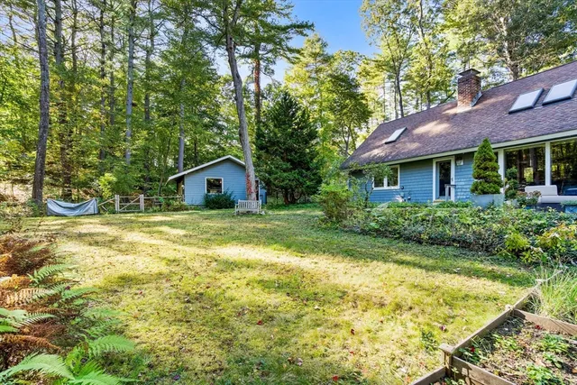 a house view with a garden space