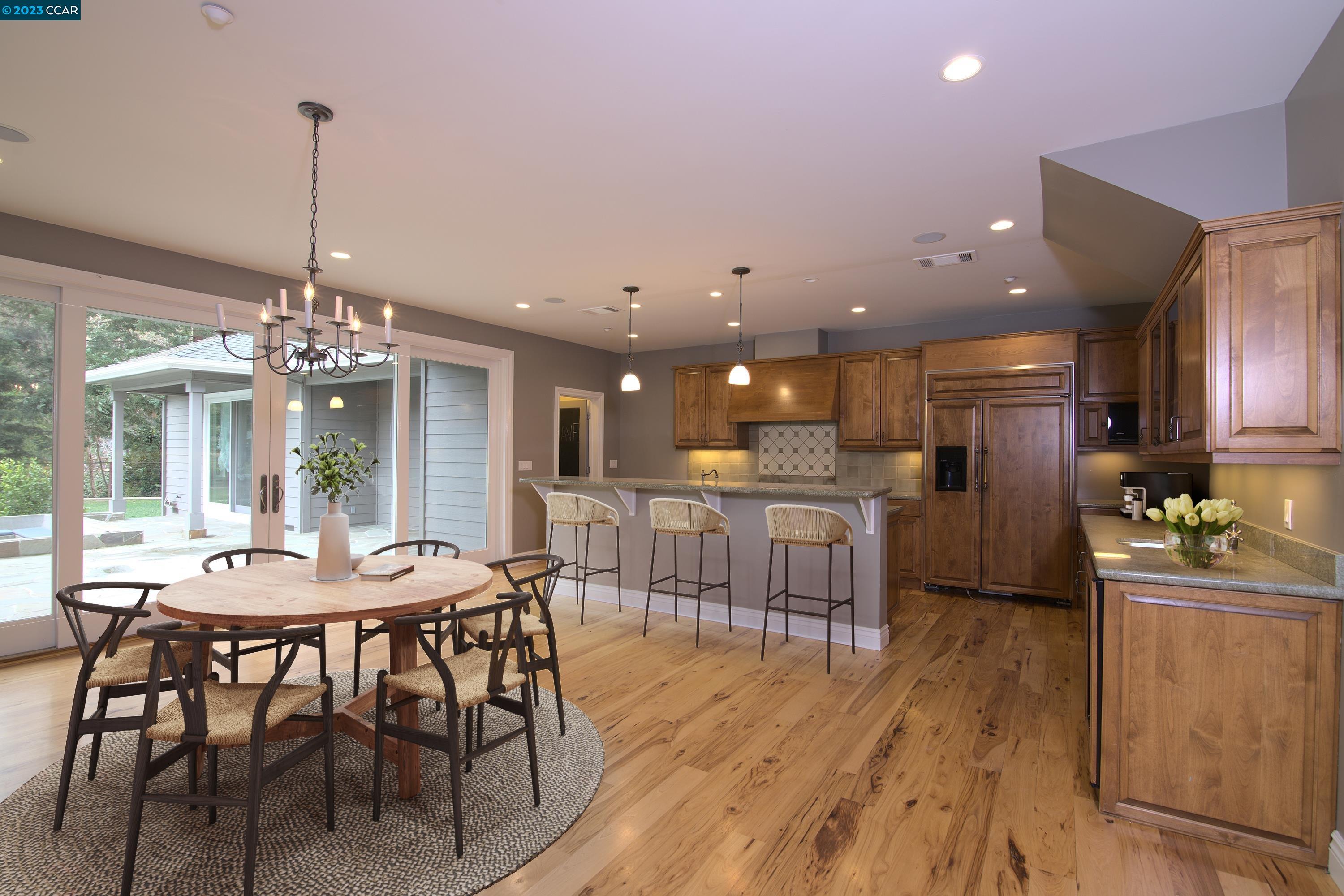 3324 Las Huertas Road Lafayette, CA 94549 - Photo 3 of 8 a kitchen with a table and chairs in it