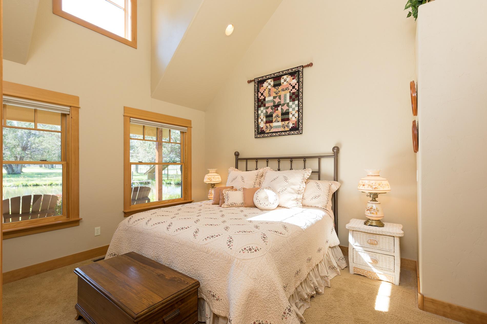 64980 Gerking Market Road Bend, OR 97703 - Photo 16 of 35 Master bedroom is on the main level with soaring vaulted celings.