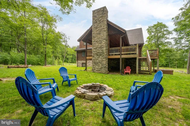 a view of balcony with couch and outdoor seating