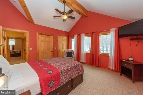 a room with furniture and air hockey table