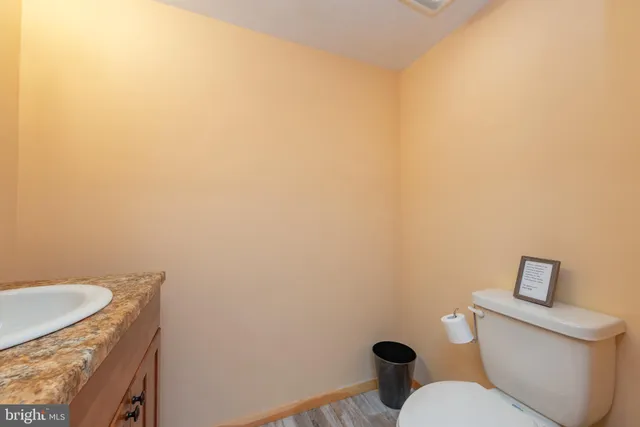 a room with gym equipment and a flat screen tv