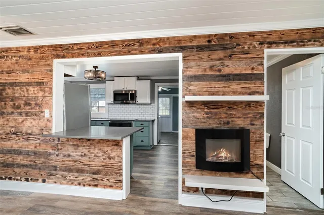 a living room with a fireplace