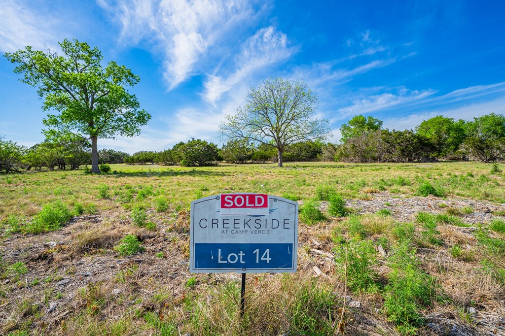 185 Coldwater Dr Center Point Kerrville, TX 78028 - Photo 4 of 15 a sign on the side of the road