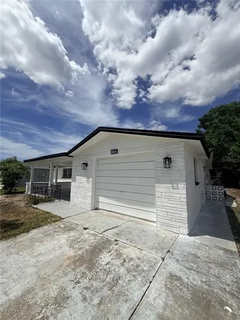 front view of house with a yard
