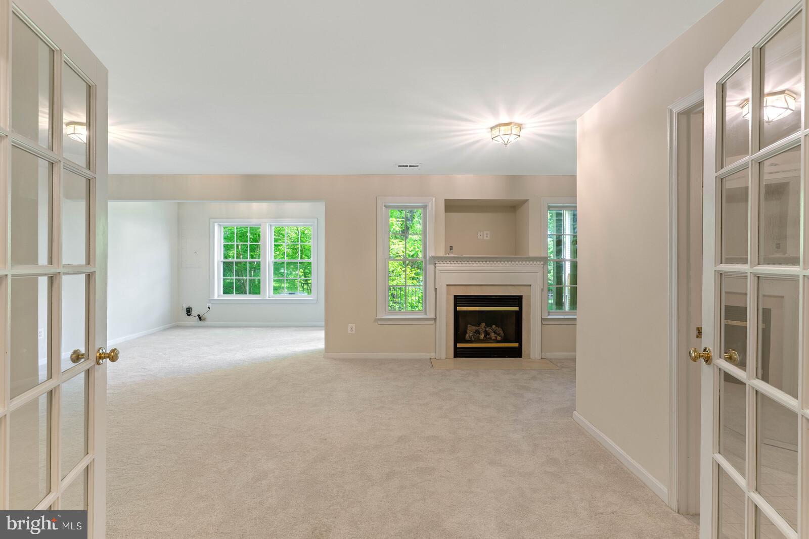 47742 Warwickshire Terrace Sterling, VA 20165 - Photo 8 of 88 Ground Level Family Room with Cozy Fireplace