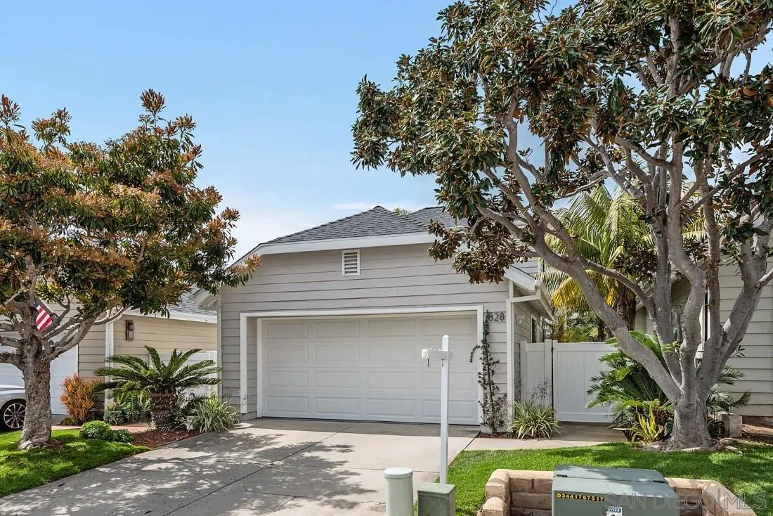 828 Bluewater Road Carlsbad, CA 92011 - Photo 1 of 36 a front view of a house with garden