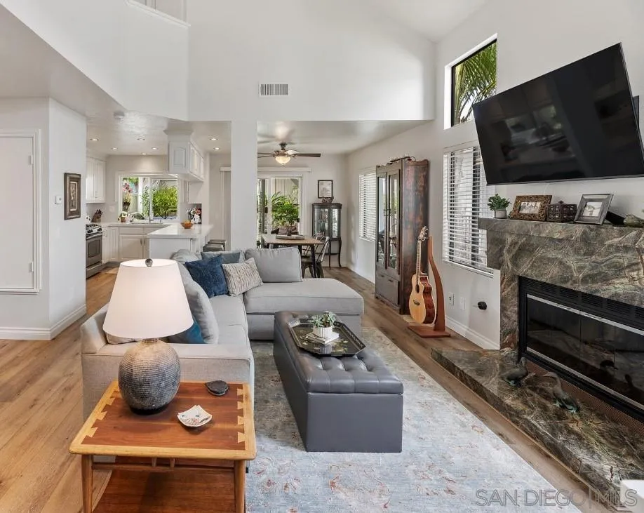 828 Bluewater Road Carlsbad, CA 92011 - Photo 6 of 36 a living room with furniture and a flat screen tv