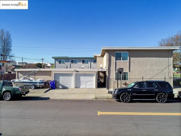 a view of a car parked in front of a house