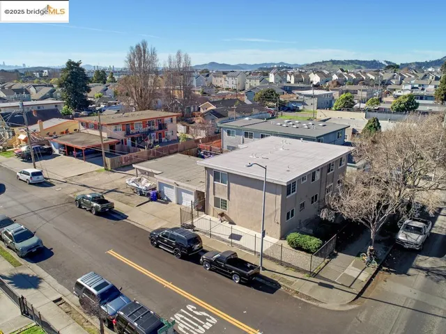 a kitchen with a sink cabinets and window