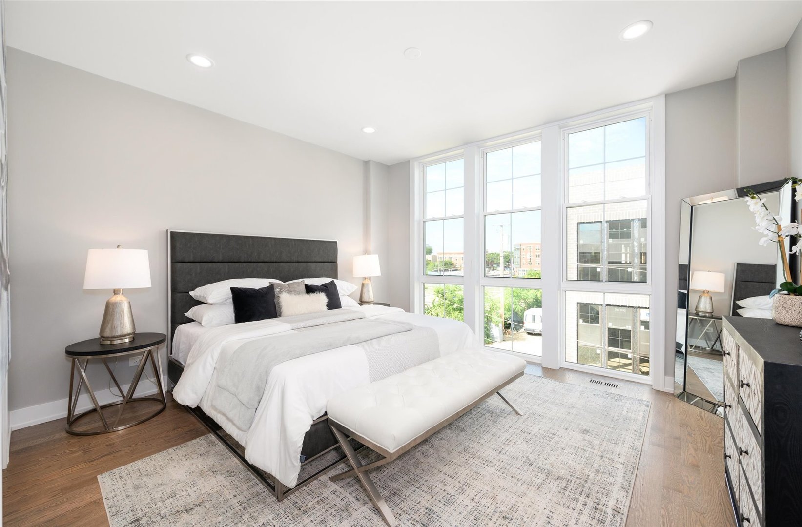4438 South Drexel Boulevard, Unit D Chicago, IL 60653 - Photo 18 of 29 a bedroom with a large bed and a large window