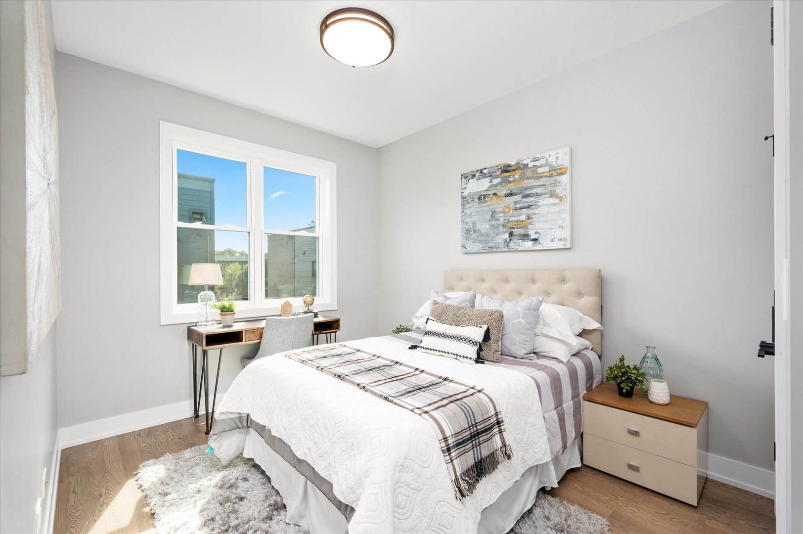4438 South Drexel Boulevard, Unit D Chicago, IL 60653 - Photo 23 of 29 a bedroom with bed and a window
