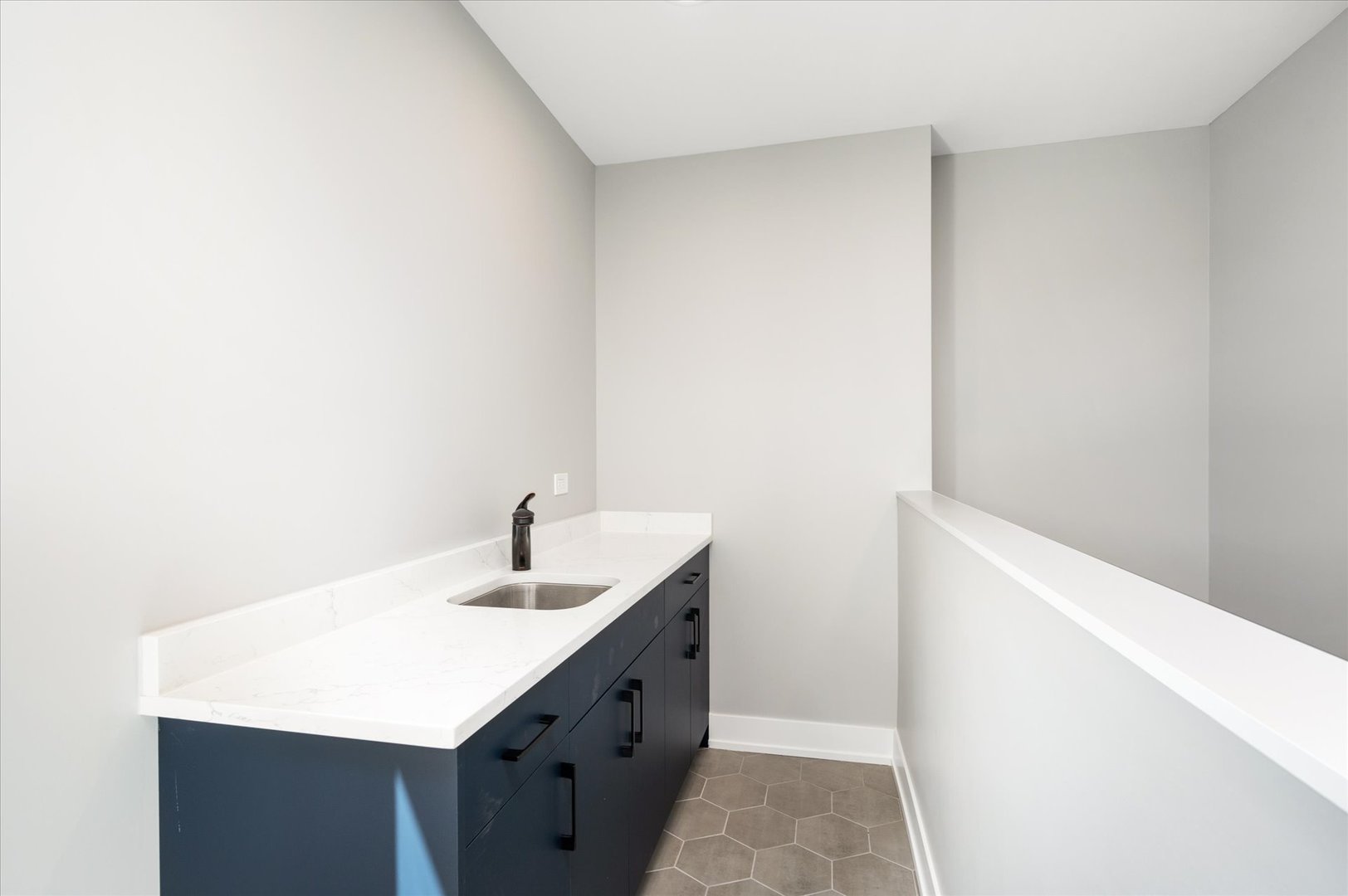 4438 South Drexel Boulevard, Unit D Chicago, IL 60653 - Photo 26 of 29 a bathroom with a sink a vanity and a mirror