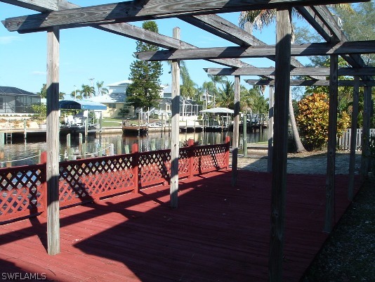 3255 Stringfellow Road St. James City, FL 33956 - Photo 3 of 16 a view of outdoor space with seating area